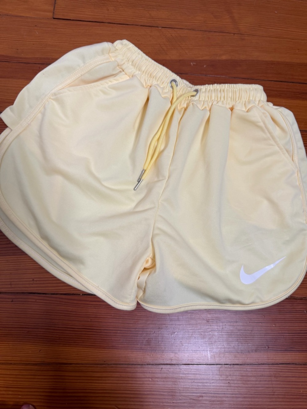 Nike Women’s Pale Yellow Athletic Running Shorts